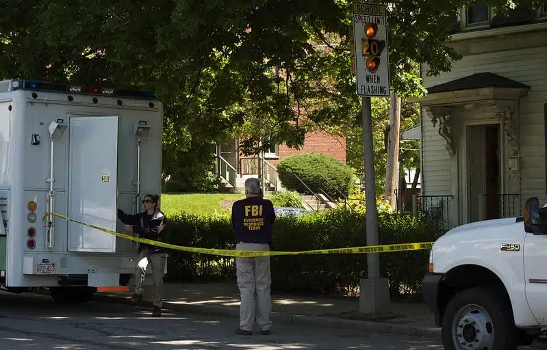 FBI Agent on sidewalk